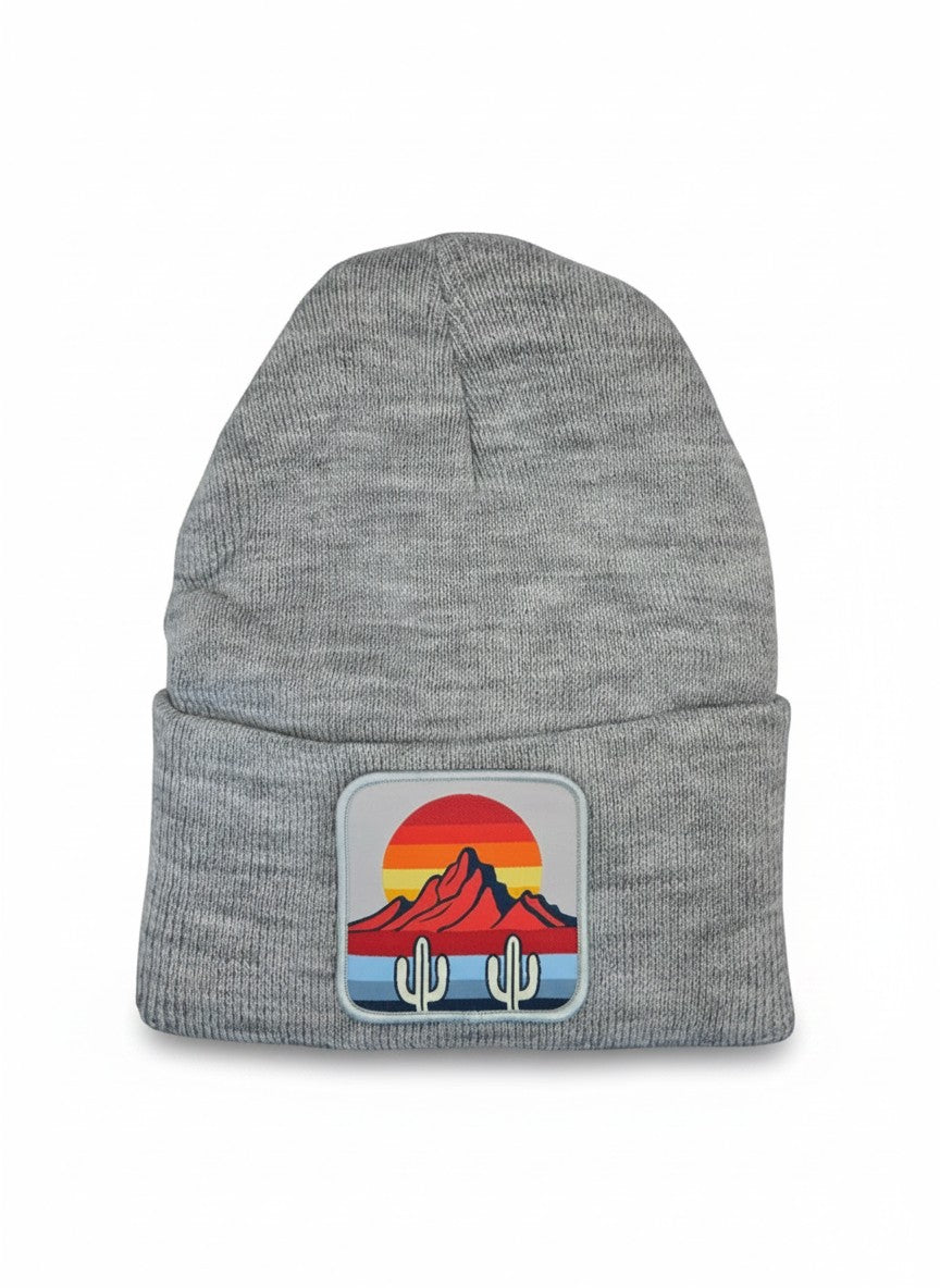 Moove Headwear grey knit beanie with a desert sunset and cactus patch. Features a ribbed cuff and a classic beanie shape.
