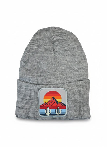Moove Headwear grey knit beanie with a desert sunset and cactus patch. Features a ribbed cuff and a classic beanie shape.