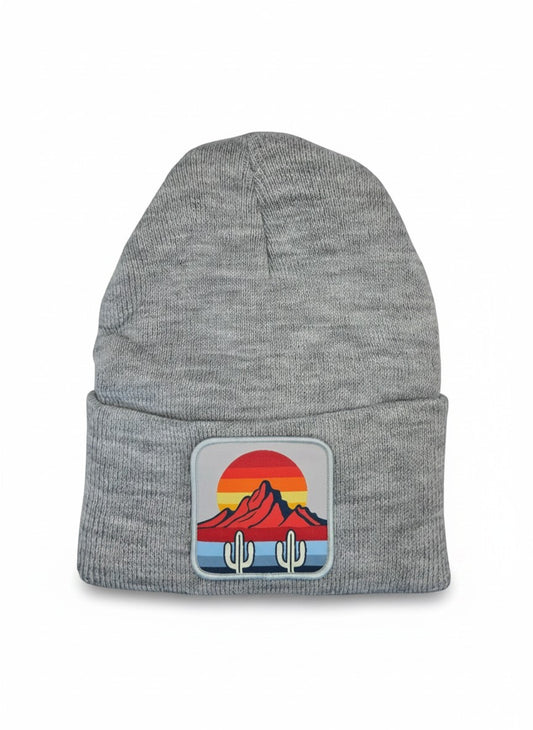 Moove Headwear grey knit beanie with a desert sunset and cactus patch. Features a ribbed cuff and a classic beanie shape.