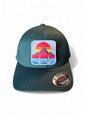 Moove Headwear dark green fitted hat with cactus and mountain sunset patch. Mid-profile structured crown.