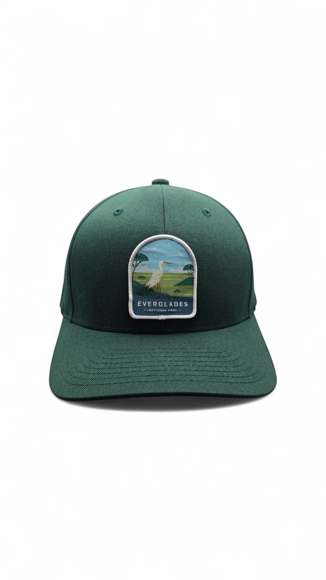Moove Headwear dark green fitted baseball cap with embroidered Everglades National Park patch featuring a white egret.