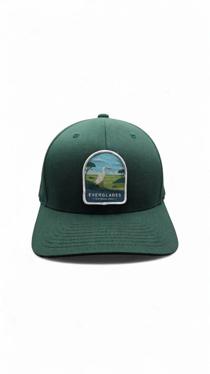 Moove Headwear dark green fitted baseball cap with embroidered Everglades National Park patch featuring a white egret.