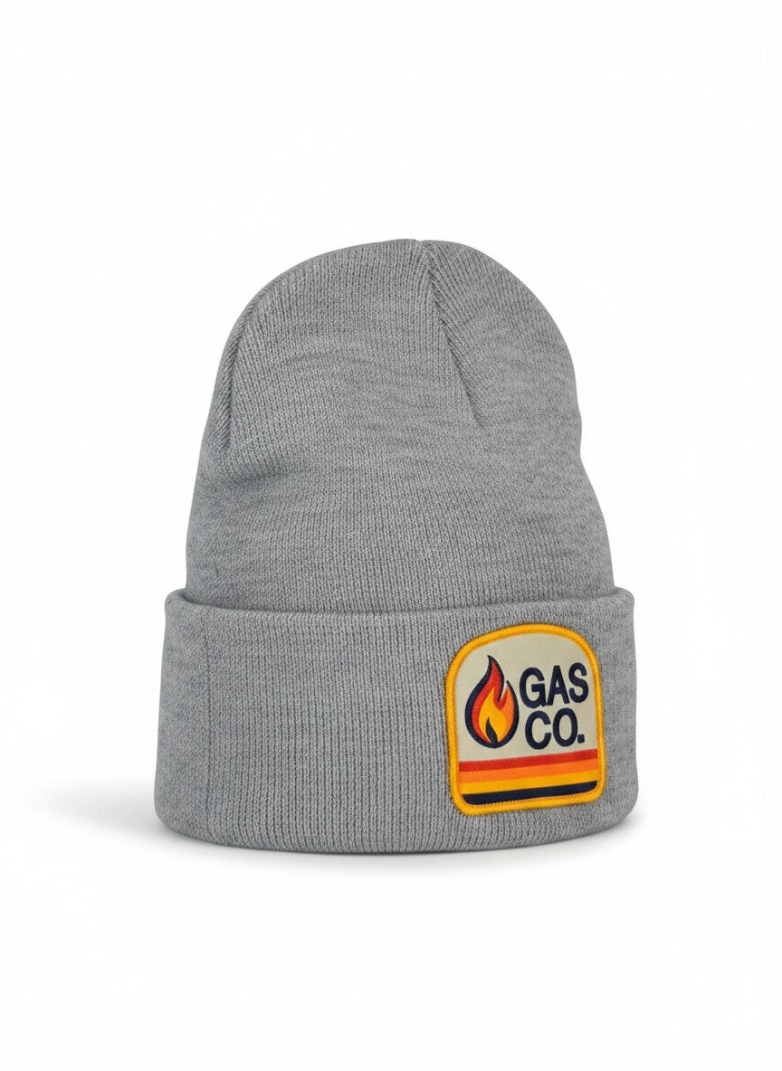 Moove Headwear grey knit cuffed beanie with a vintage Gas Co. flame logo patch. Unisex fit.
