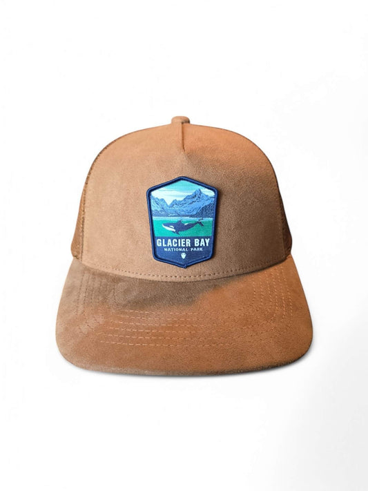 Moove Headwear tan suede trucker hat with mesh back and Glacier Bay National Park patch.