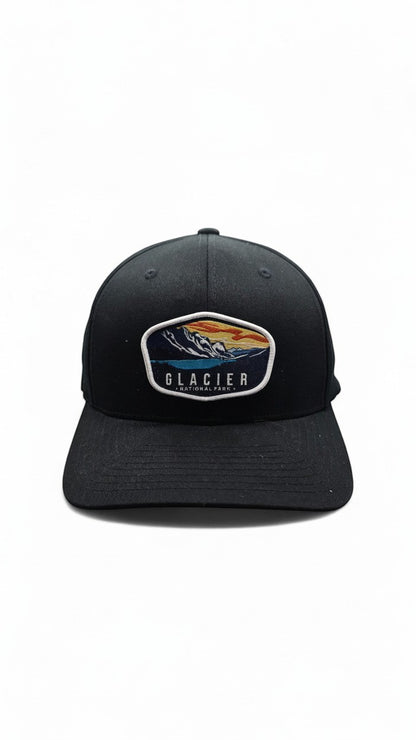Moove Headwear black adjustable hiking cap with embroidered Glacier National Park logo patch