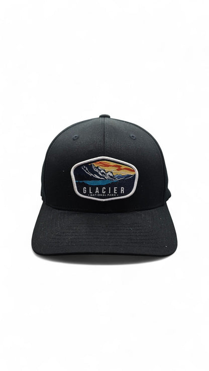 Moove Headwear black adjustable hiking cap with embroidered Glacier National Park logo patch