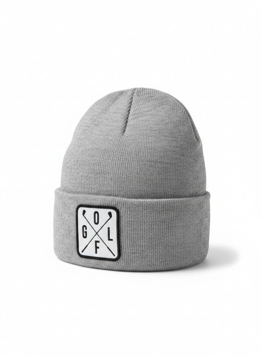 Moove Headwear grey acrylic knit beanie with a white square patch featuring crossed golf clubs and the word GOLF.