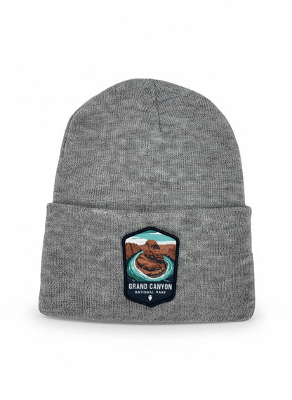 Moove Headwear grey acrylic knit beanie with embroidered Grand Canyon National Park patch on front.