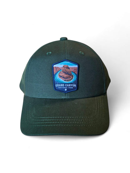 Moove Headwear dark green dad hat with Grand Canyon National Park embroidered patch and adjustable strap.