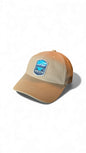 Moove Headwear tan cotton dad hat with Grand Teton National Park embroidered patch and adjustable strap.