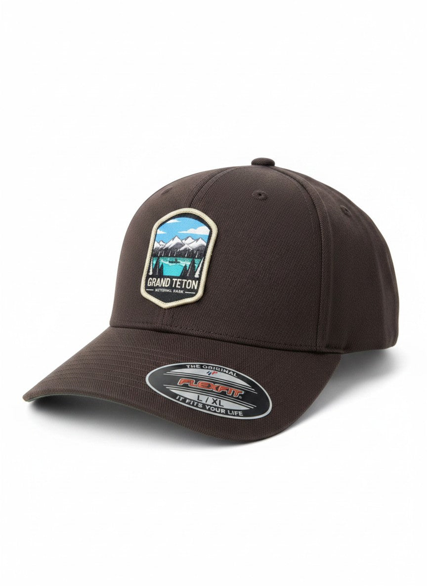 Moove Headwear brown fitted cap with Grand Teton National Park embroidered patch, outdoor scene with lake and mountains.