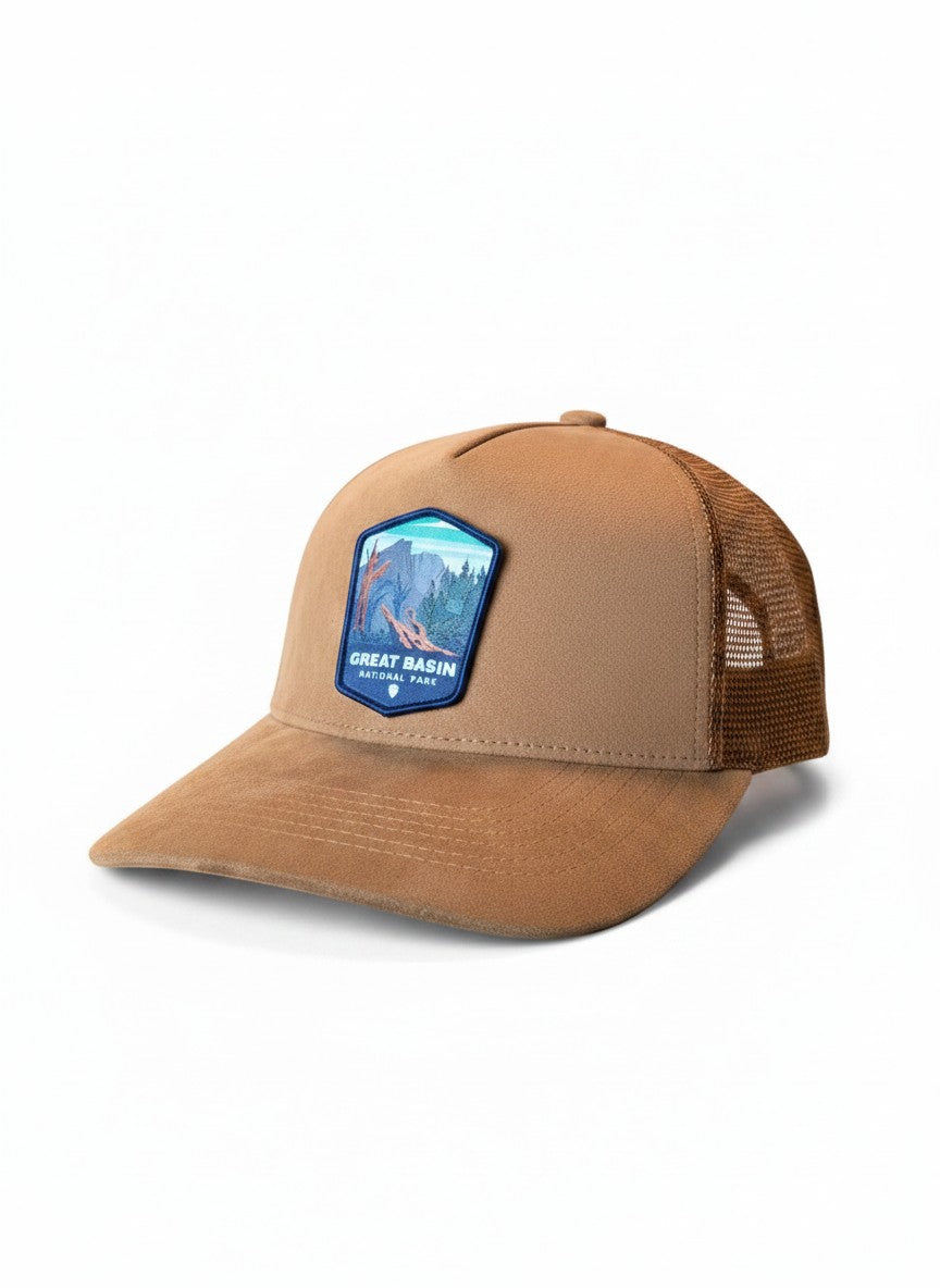Moove Headwear tan suede trucker hat with mesh back and Great Basin National Park patch.