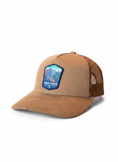 Moove Headwear tan suede trucker hat with mesh back and Great Basin National Park patch.