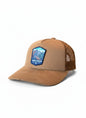 Moove Headwear tan suede trucker hat with mesh back and Great Basin National Park patch.