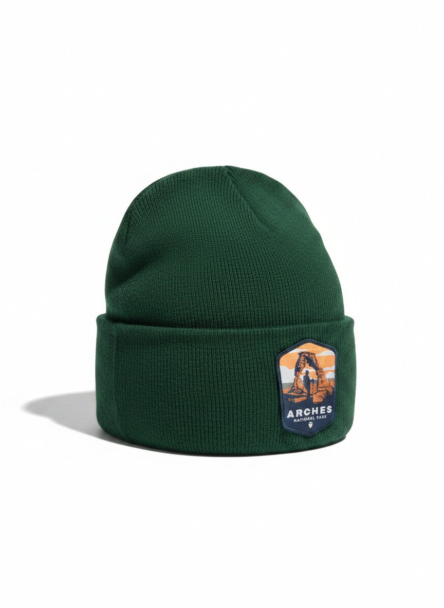 Moove Headwear dark green knit beanie with Arches National Park patch, perfect for hiking.