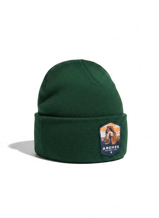 Moove Headwear dark green knit beanie with Arches National Park patch, perfect for hiking.