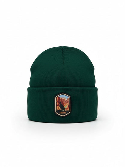 Moove Headwear dark green rib-knit winter beanie with a Grand Canyon Arizona woven patch on the front cuff.