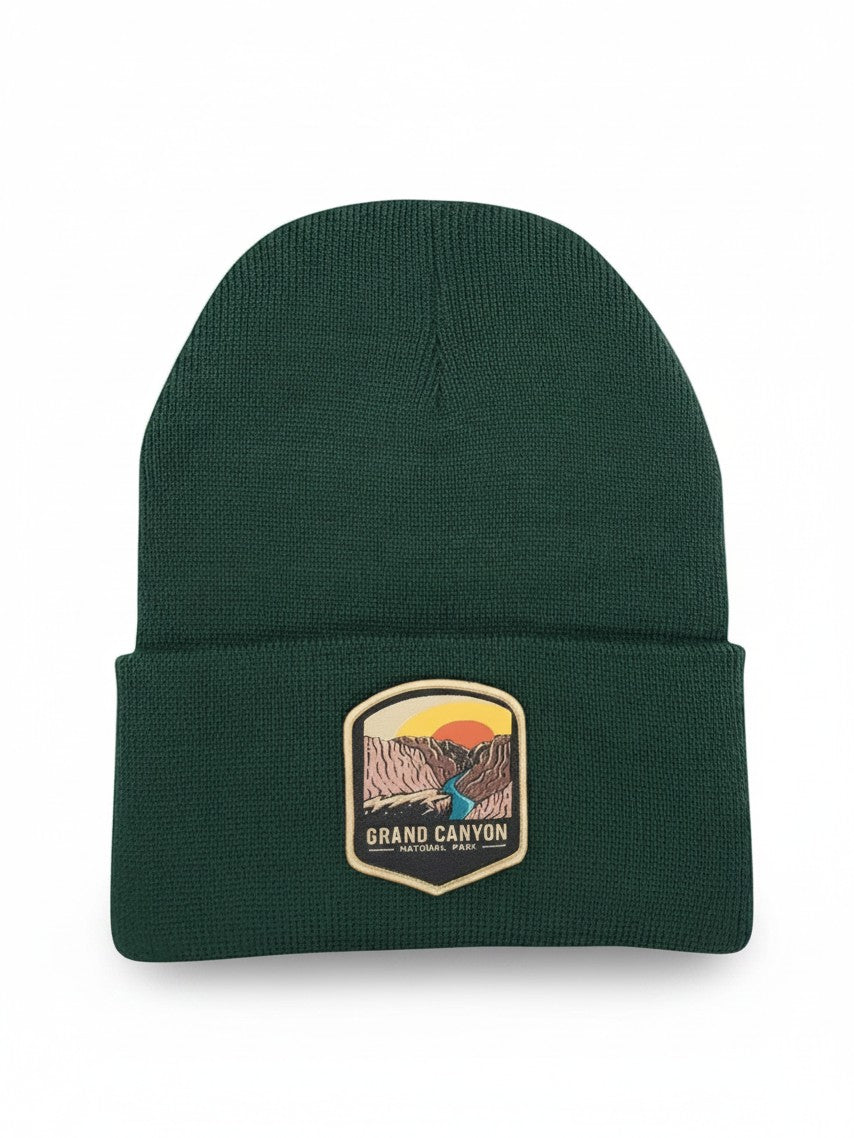 Moove Headwear dark green knit beanie featuring a Grand Canyon National Park patch with a sunset landscape design.
