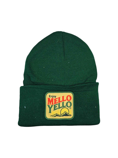 Moove Headwear green knit beanie with a retro Mello Yello patch featuring a sun over mountains.