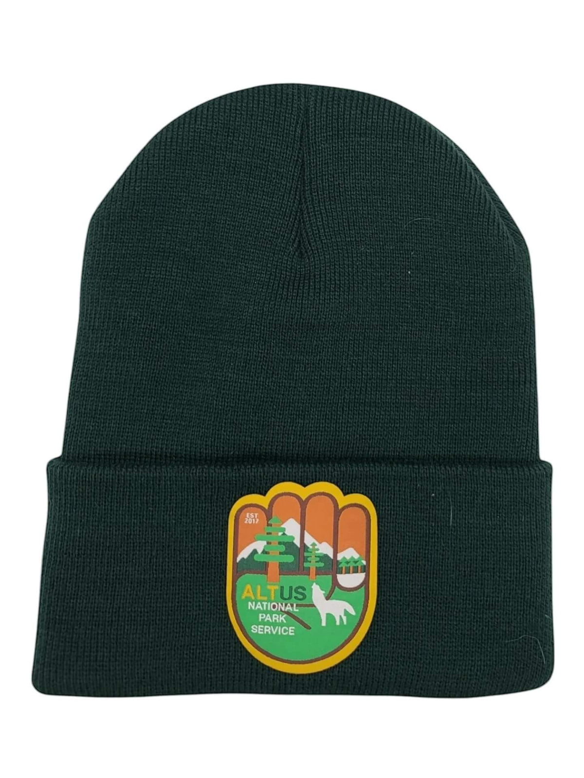 Moove Headwear dark green cuffed knit beanie with an AltUs National Park Service patch for winter hiking