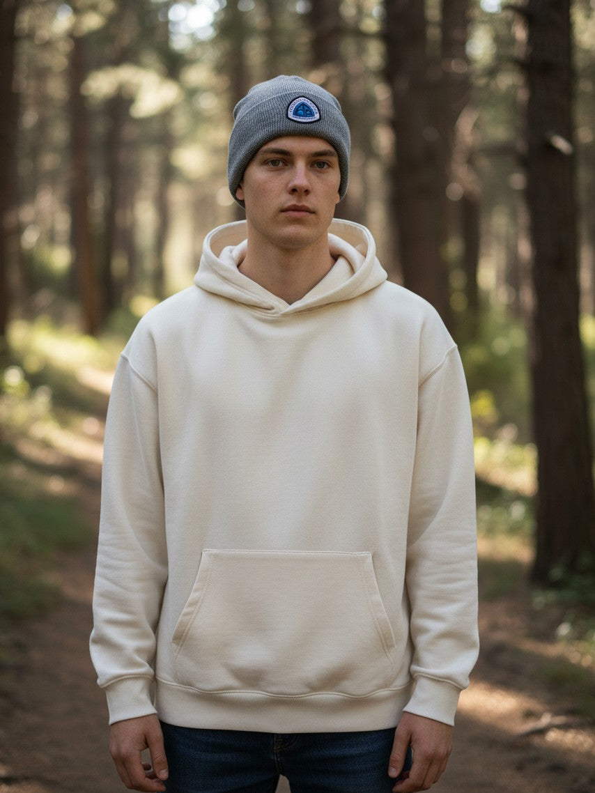 Moove Headwear grey Continental Divide Trail hiking beanie worn by a man in a forest setting