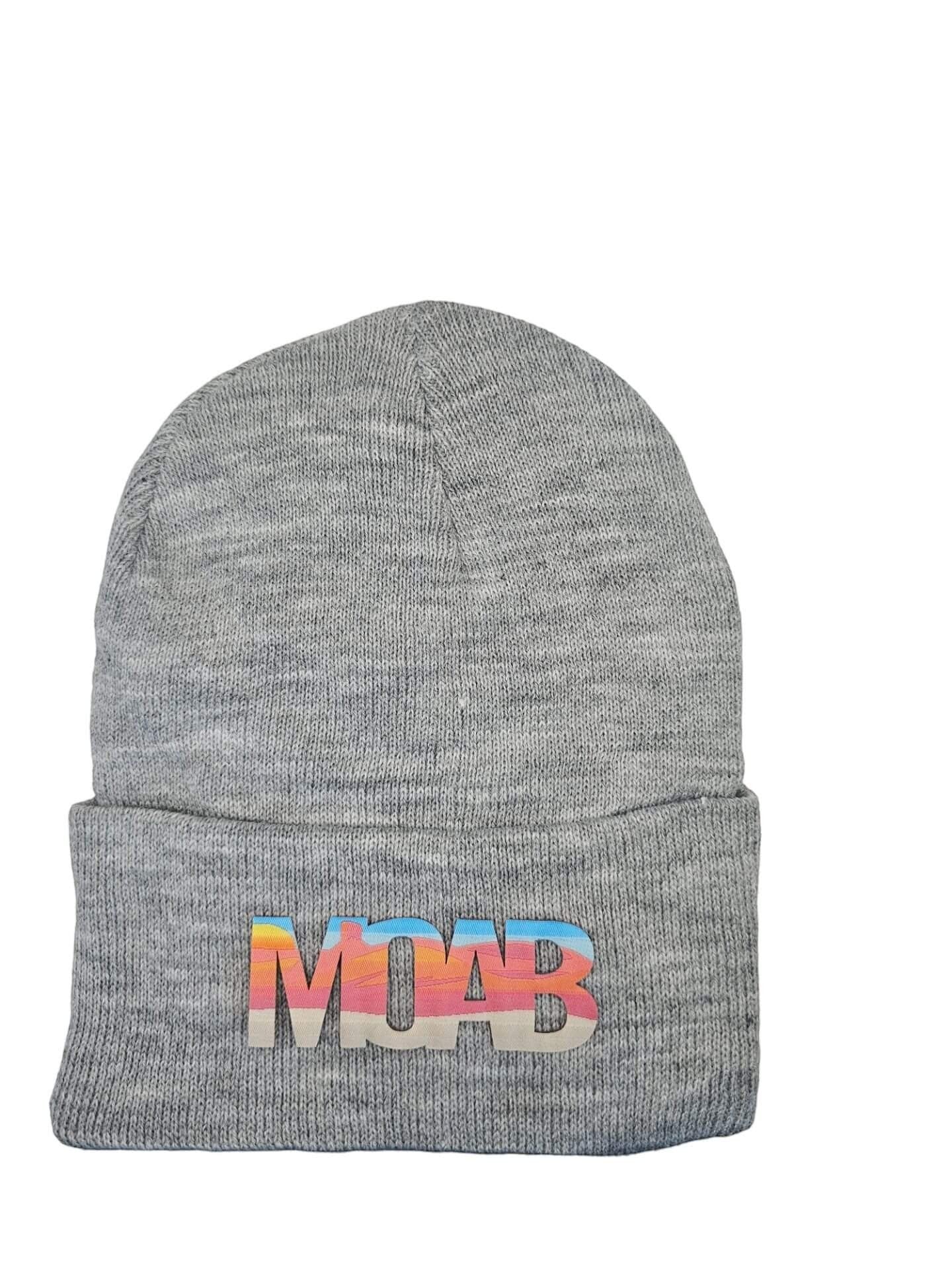 Moove Headwear grey acrylic knit beanie with colorful "MOAB" sunset patch. One size fits all.