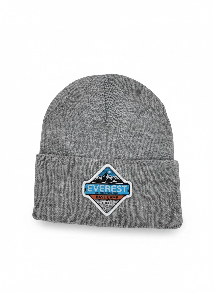 Moove Headwear grey wool knit beanie with Everest Base Camp patch. Warm, durable, and stylish trekking hat.