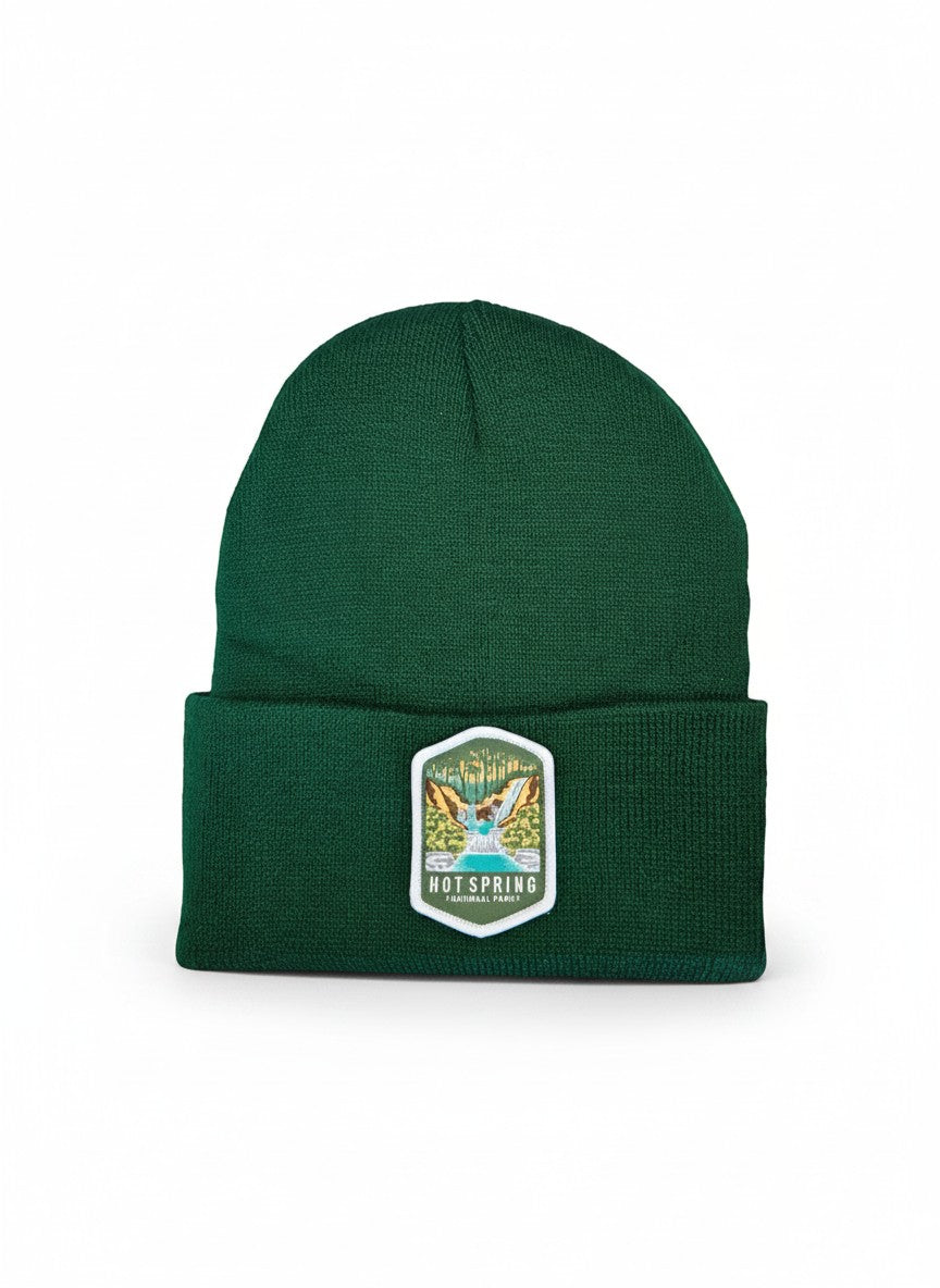 Moove Headwear dark green acrylic rib-knit beanie with Hot Springs National Park embroidered patch.