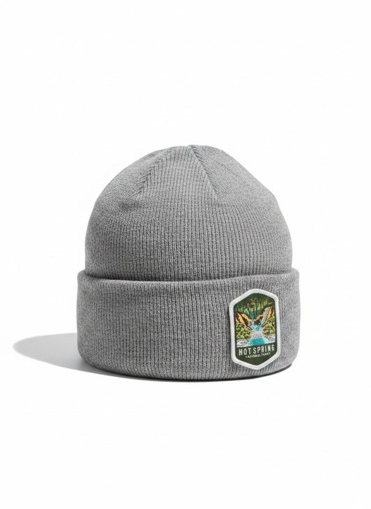 Moove Headwear grey acrylic rib-knit beanie with Hot Springs National Park embroidered patch on front.
