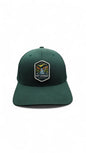 Moove Headwear dark green fitted baseball cap with embroidered Hot Springs National Park patch.