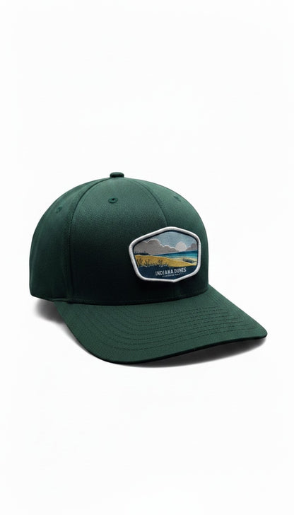 Moove Headwear dark green cotton blend baseball cap with Indiana Dunes patch, adjustable strap, and breathable design.