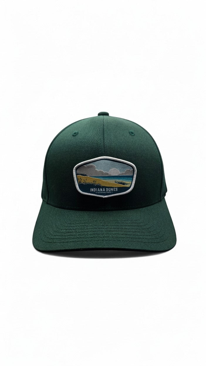 Moove Headwear dark green cotton blend baseball cap with Indiana Dunes National Park embroidered patch and adjustable strap.