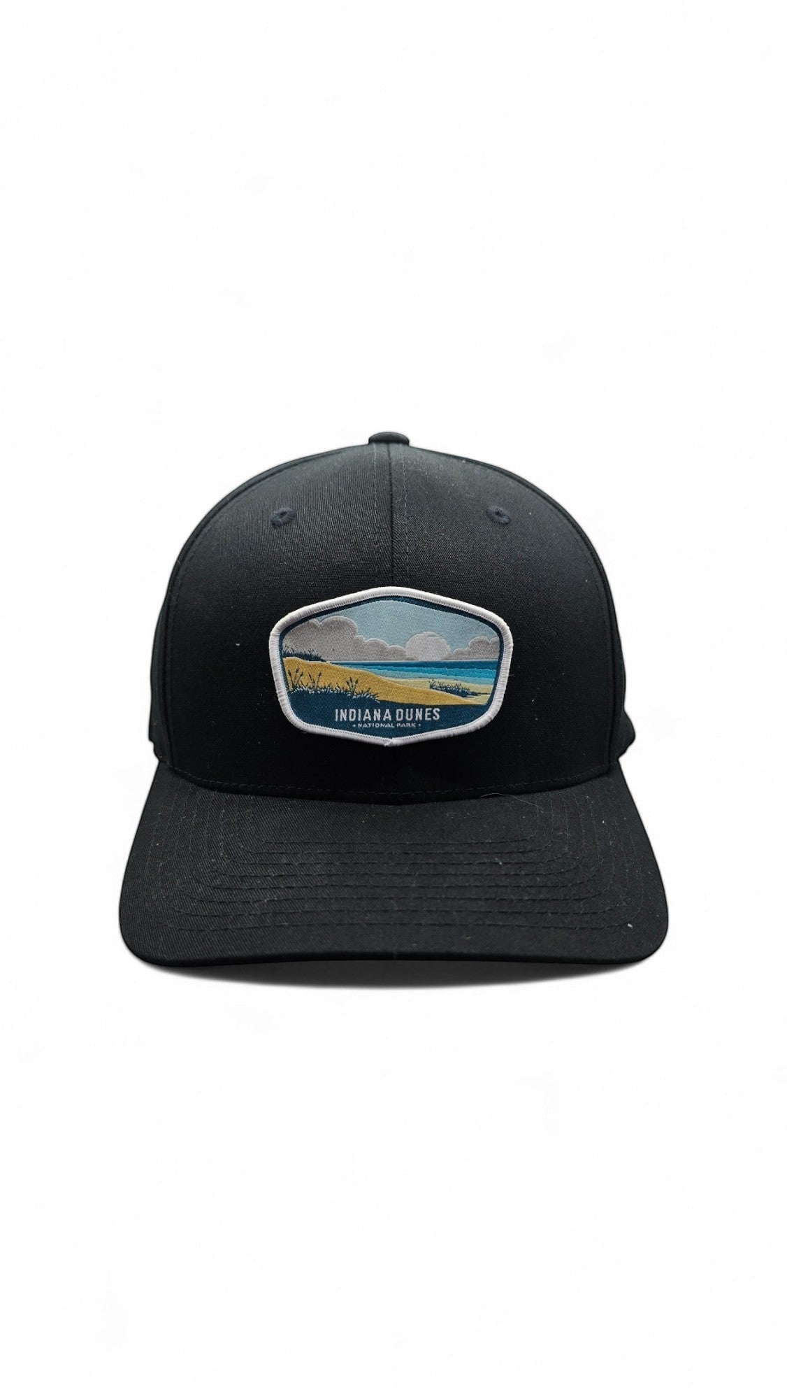 Moove Headwear black fitted hat with Indiana Dunes National Park embroidered patch, adjustable strap, and breathable design.