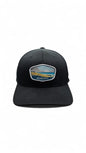 Moove Headwear black fitted hat with Indiana Dunes National Park embroidered patch, adjustable strap, and breathable design.