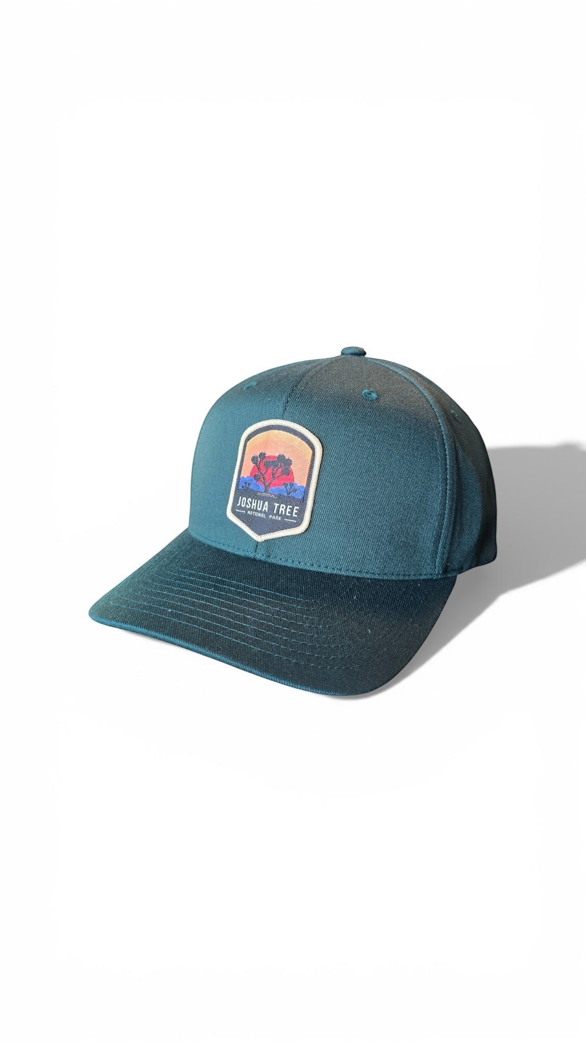 Moove Headwear teal Flexfit cap with Joshua Tree National Park patch, ideal for hiking and outdoor adventures.