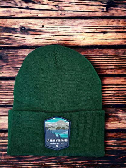 Moove Headwear dark green acrylic rib-knit beanie with Lassen Volcanic National Park embroidered patch.