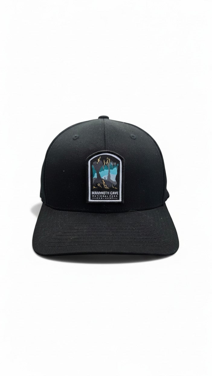 Moove Headwear black baseball cap with embroidered Mammoth Cave National Park patch featuring cave formations and text.