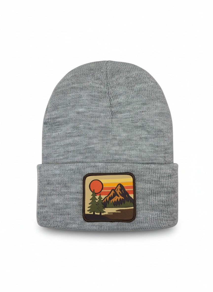 Moove Headwear grey knit cuffed beanie with vintage mountain sunset patch. Unisex winter ski cap.