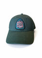 Moove Headwear dark green cotton dad hat with National Park Service embroidered patch and adjustable strap.