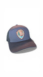 Moove Headwear National Park Service snapback hat with embroidered patch, blue mesh back, and adjustable strap.