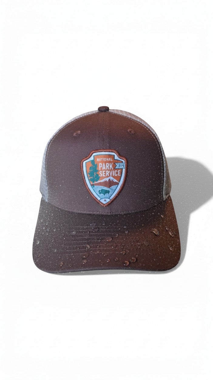 Moove Headwear National Park Service snapback hat in brown with mesh back and embroidered NPS logo patch.