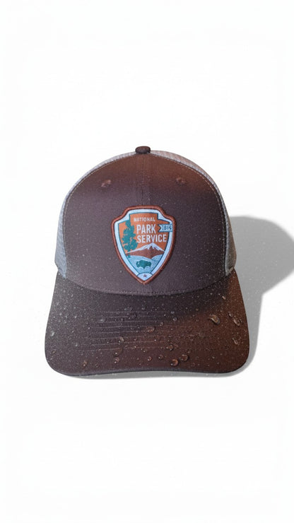 Moove Headwear National Park Service snapback hat in brown with mesh back and embroidered NPS logo patch.