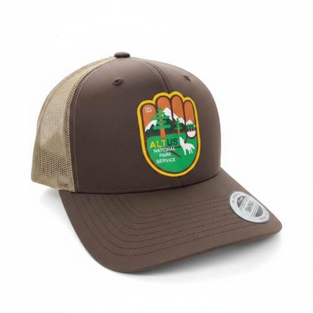 Moove Headwear brown trucker hat with National Park Service logo patch, mesh back, and snapback closure.