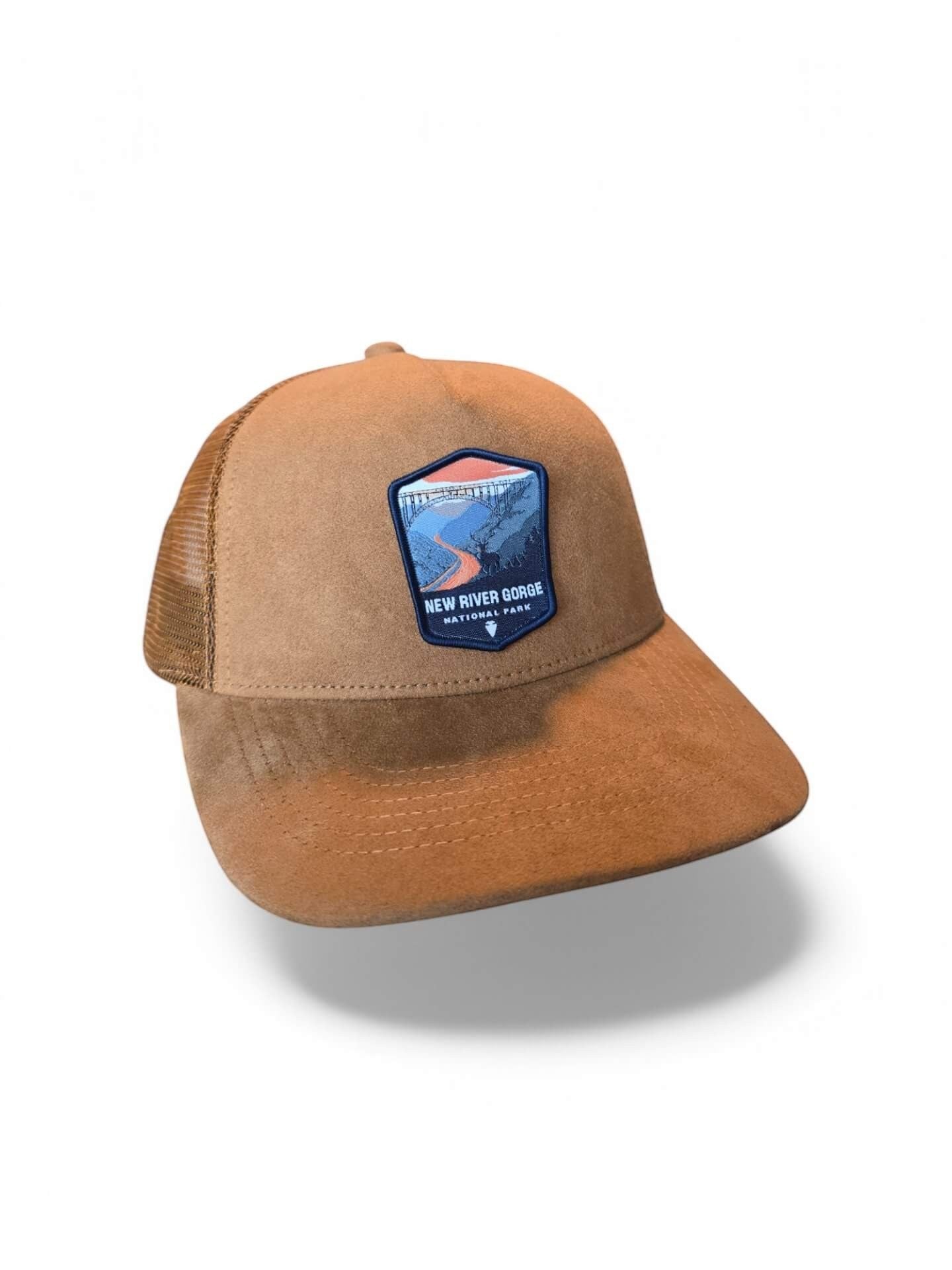 Moove Headwear New River Gorge National Park suede trucker hat with mesh back and adjustable snap closure.