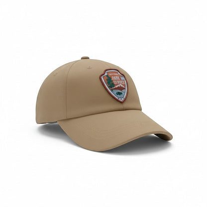 Moove Headwear tan adjustable embroidered dad hat with National Park Service emblem