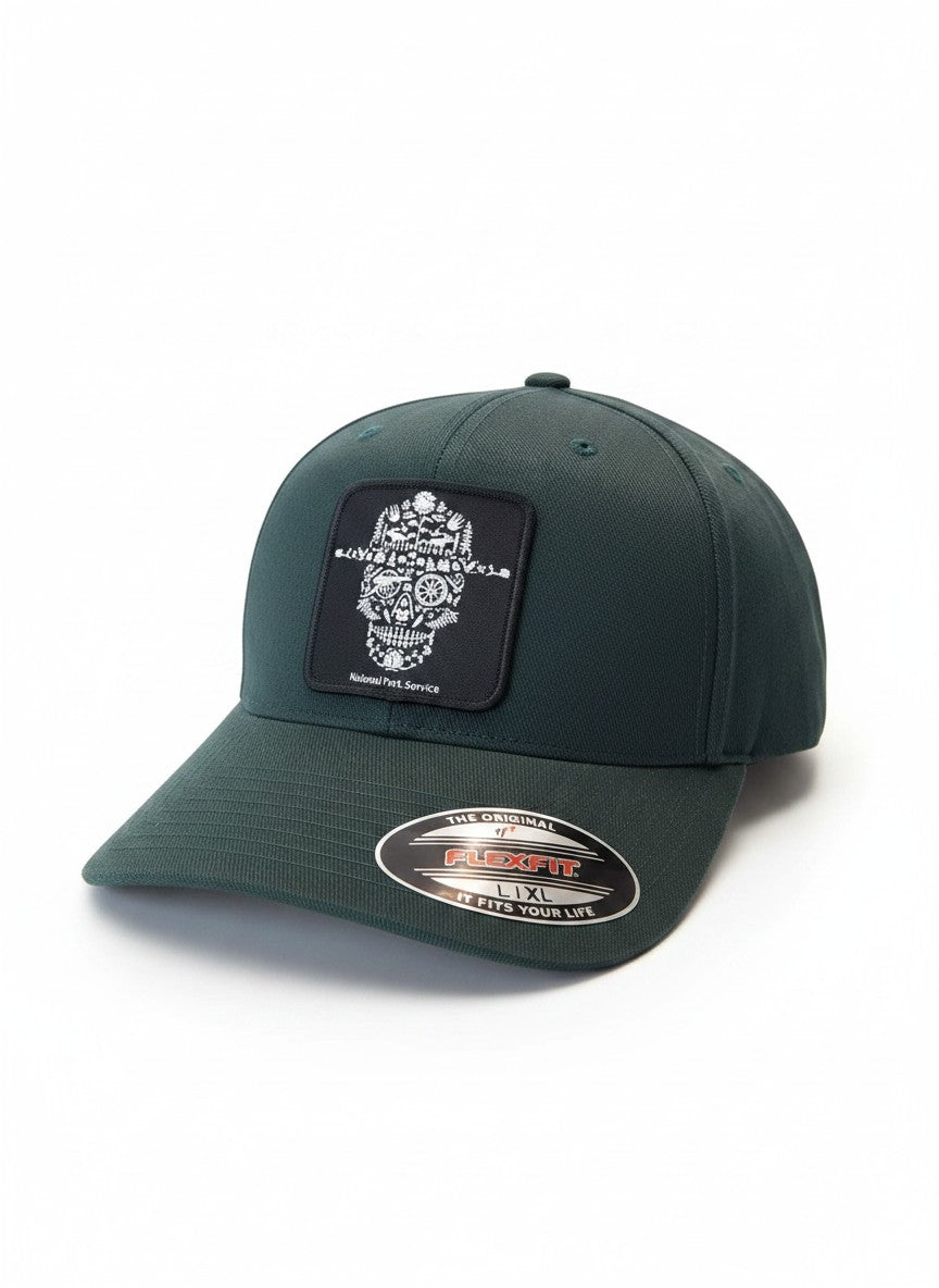Moove Headwear dark green fitted National Park Service ranger hat with a skull design patch.