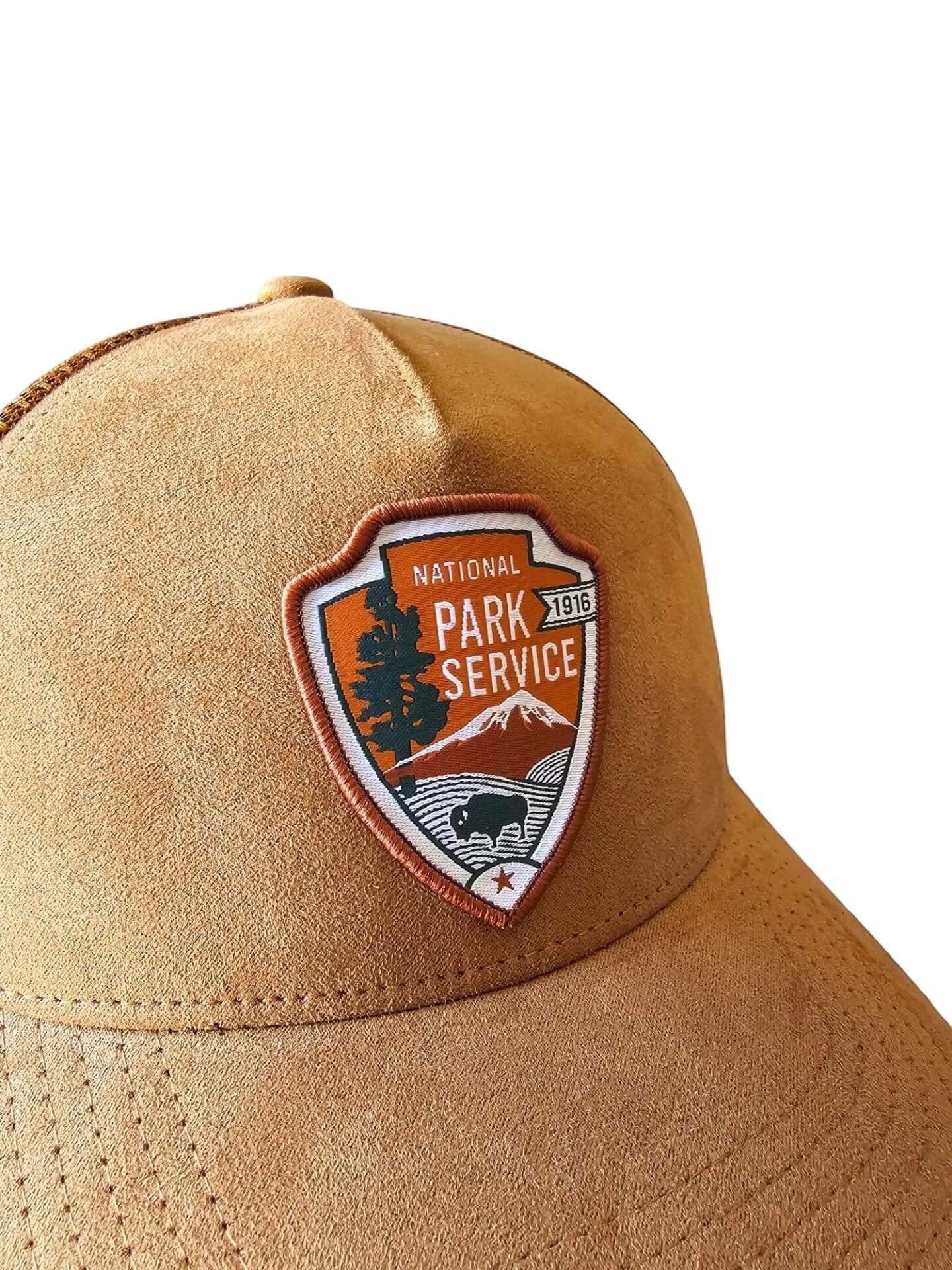 Moove Headwear tan suede National Park Service embroidered snapback hat with adjustable closure.