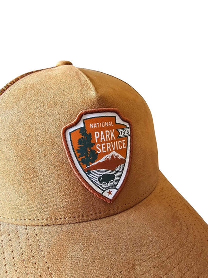 Moove Headwear tan suede National Park Service embroidered snapback hat with adjustable closure.