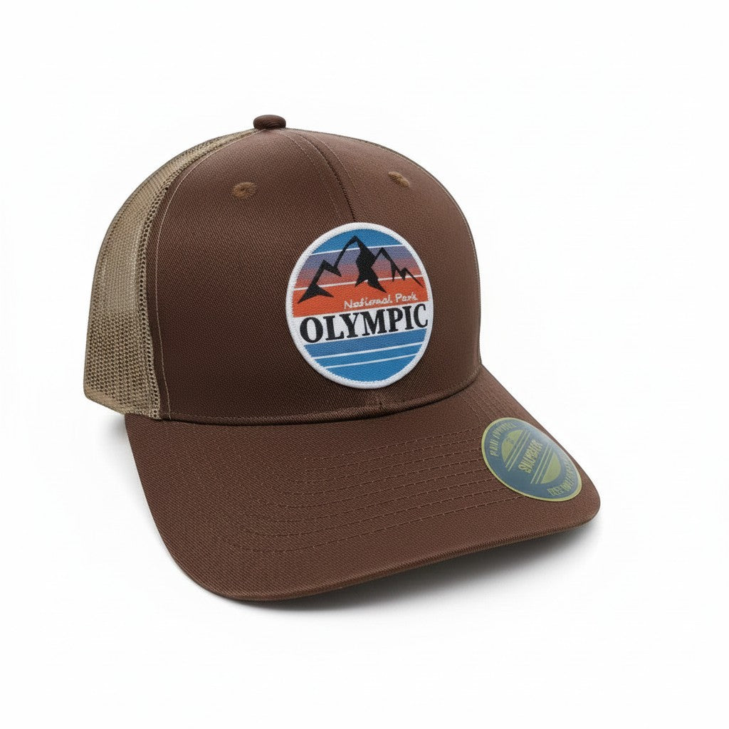 Moove Headwear brown trucker hat with mesh back and Olympic National Park mountain graphic patch.