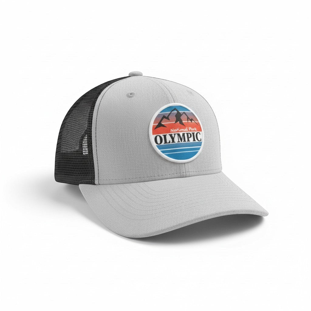 Moove Headwear light grey trucker hat with black mesh back and Olympic National Park graphic patch.